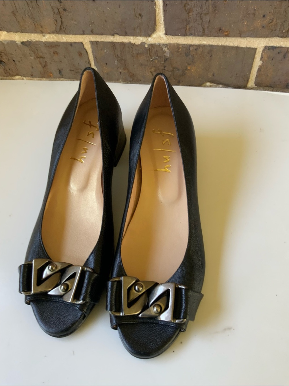 Black Leather Women's Flats with Decorative Metal Accent